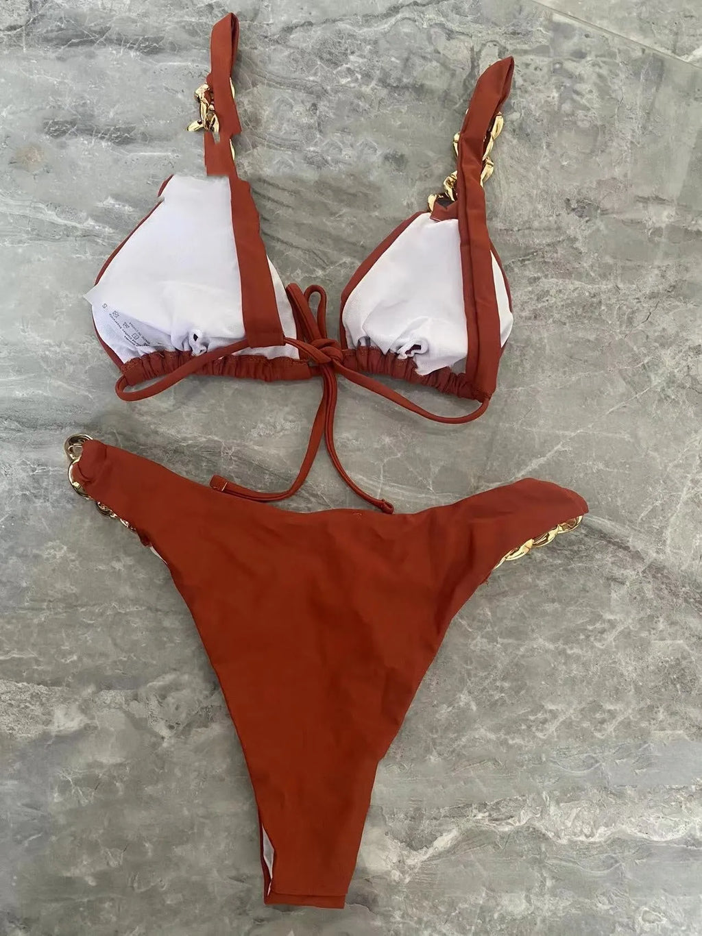 Brown women's push up bikini swimsuit with a tube top and ring tether detail.
