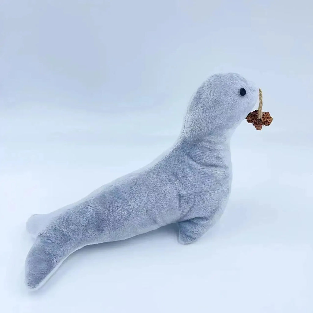 Blue sea lion plush cat toy with bell sound, catnip filling and gall fruit grinding surface