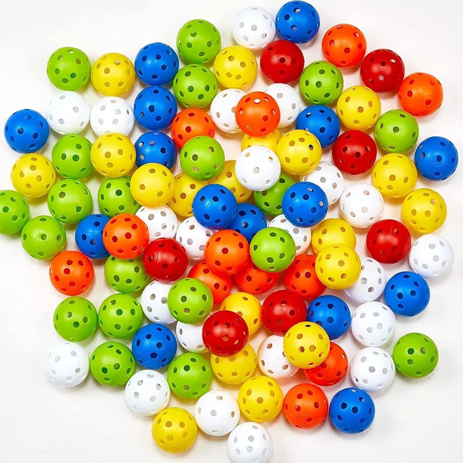 Multi-colour 26-hole golf practice balls in red, orange, blue, green, white, and yellow, displayed in a net bag.