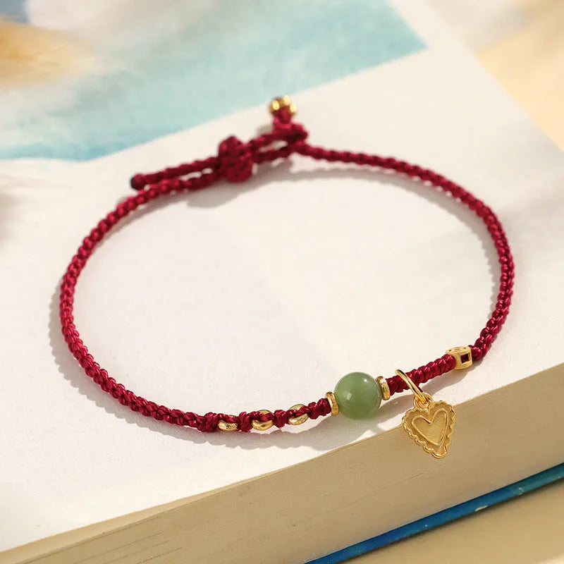 Handmade woven women's bracelet crafted from 925 silver with Hetian jade in red colour option