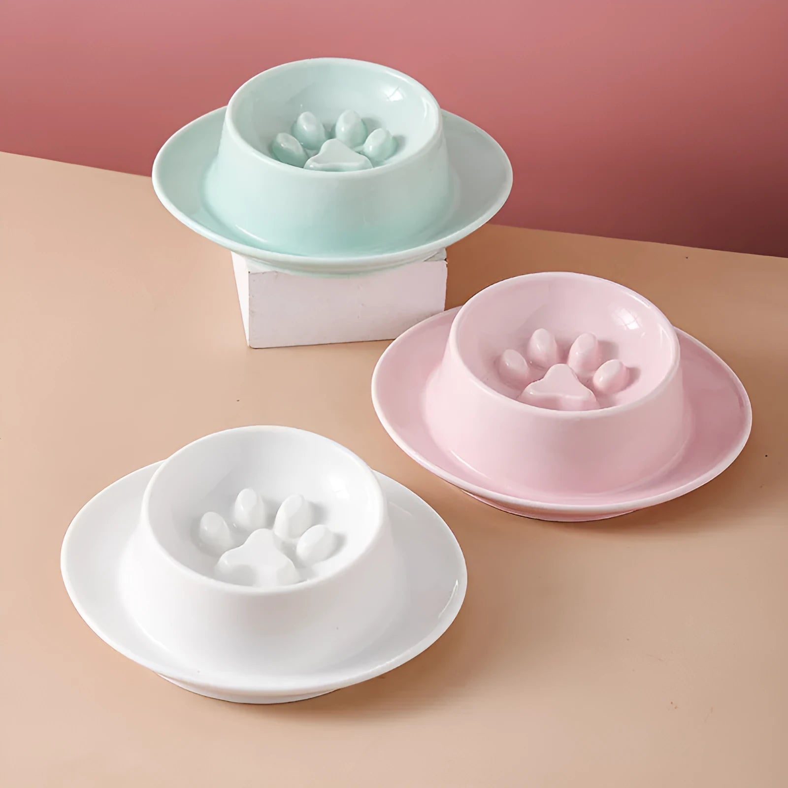 Green ceramic slow feeder pet bowl with anti-choke basin and neck protection design.
