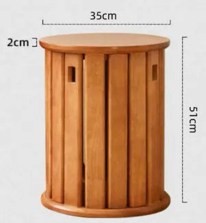 Stackable iron dining stool with large round seat in smoked black finish.