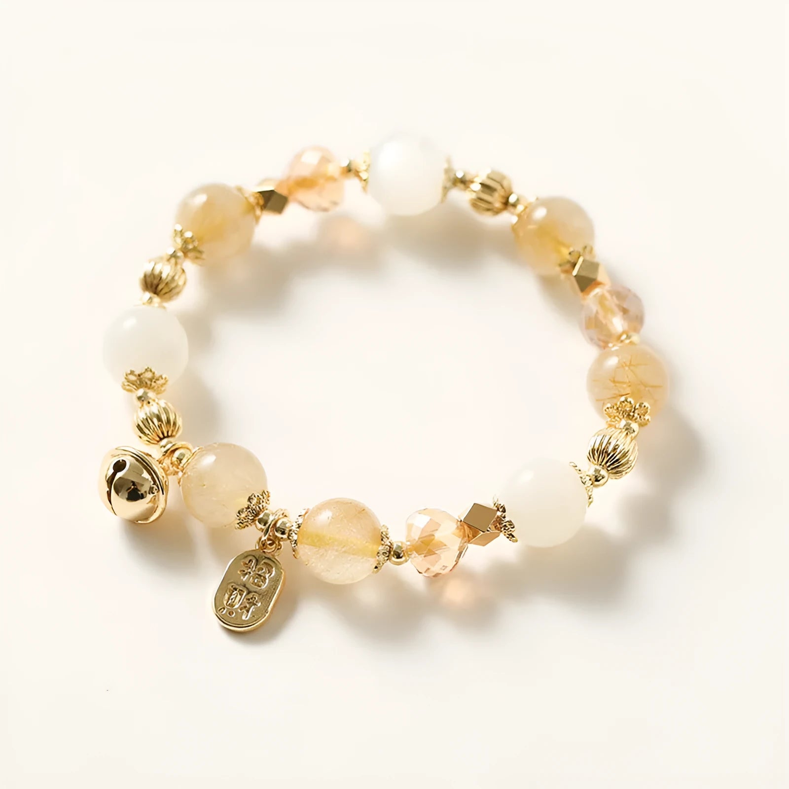 Gold electroplated rutilated quartz bracelet with faceted crystal beads in Lucky Fortune colour