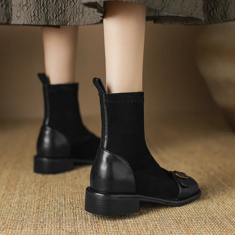 Women's black low heel ankle boots with lace-up front and decorative belt buckle stitching