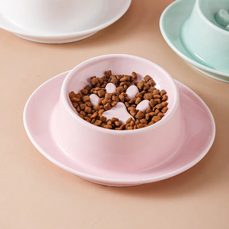 Green ceramic slow feeder pet bowl with anti-choke basin and neck protection design.