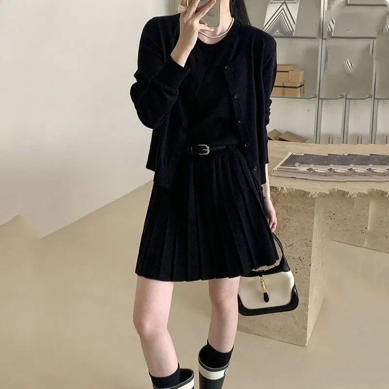 Women's grey art retro knitted cardigan and pleated vest skirt two-piece set.