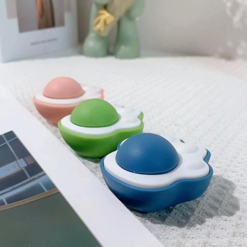 Blue, green and pink catnip ball toys for interactive play and dental cleaning