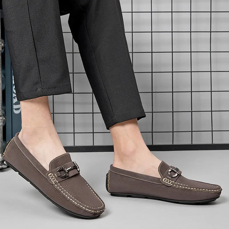 Men's beige casual slip-on shoes made from two-layer cowhide leather with a round toe and rubber sole.