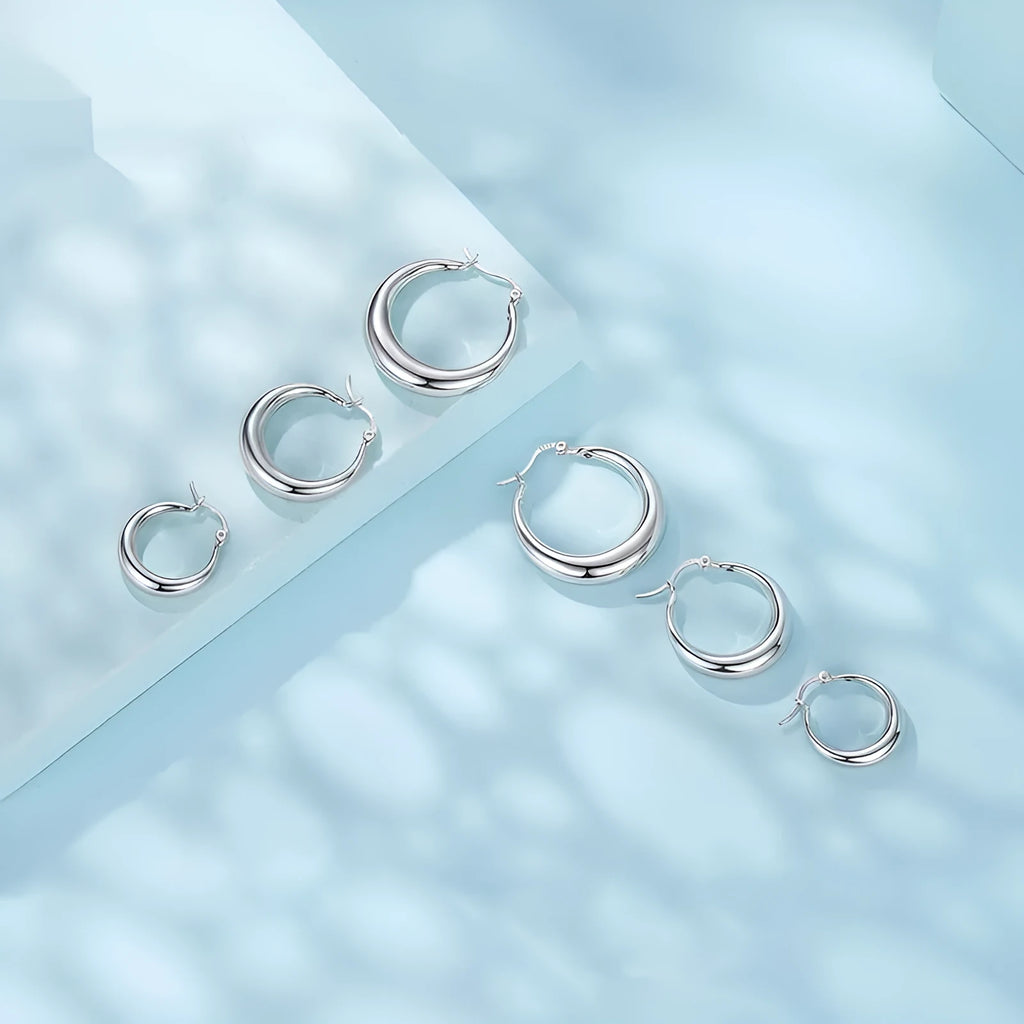 Copper geometric ring earrings with silver needle clip attachment in three size options