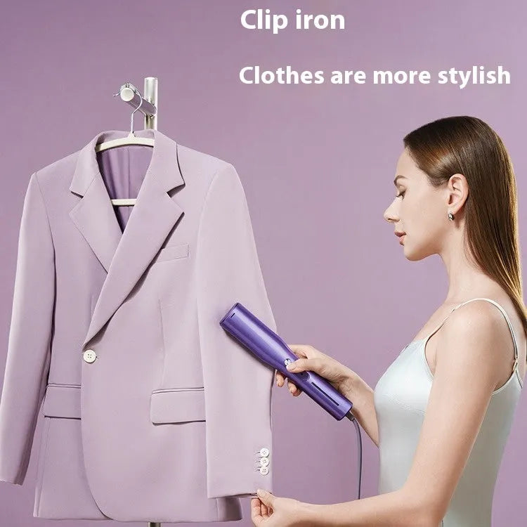 Handheld garment steamer portable pressing machine with plastic clip.