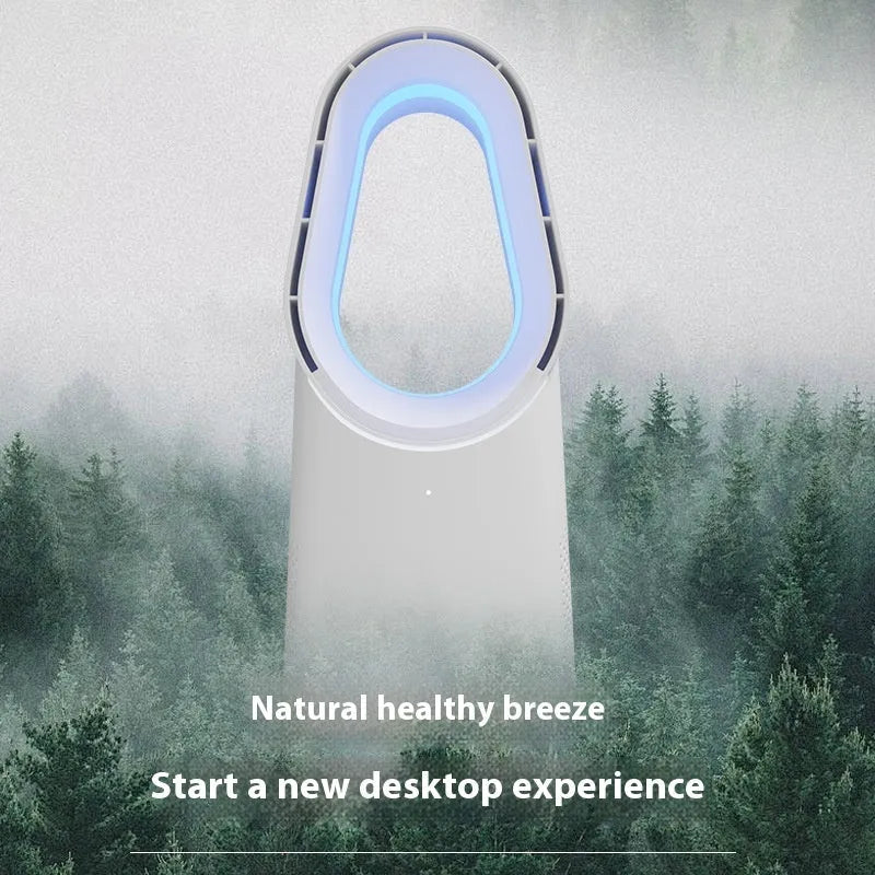 White bladeless tower fan with touch screen display and remote control on a desk.