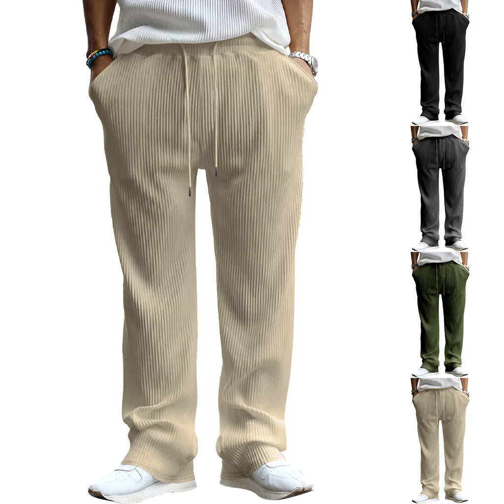 Men's loose straight leg striped casual trousers in army green on a plain background
