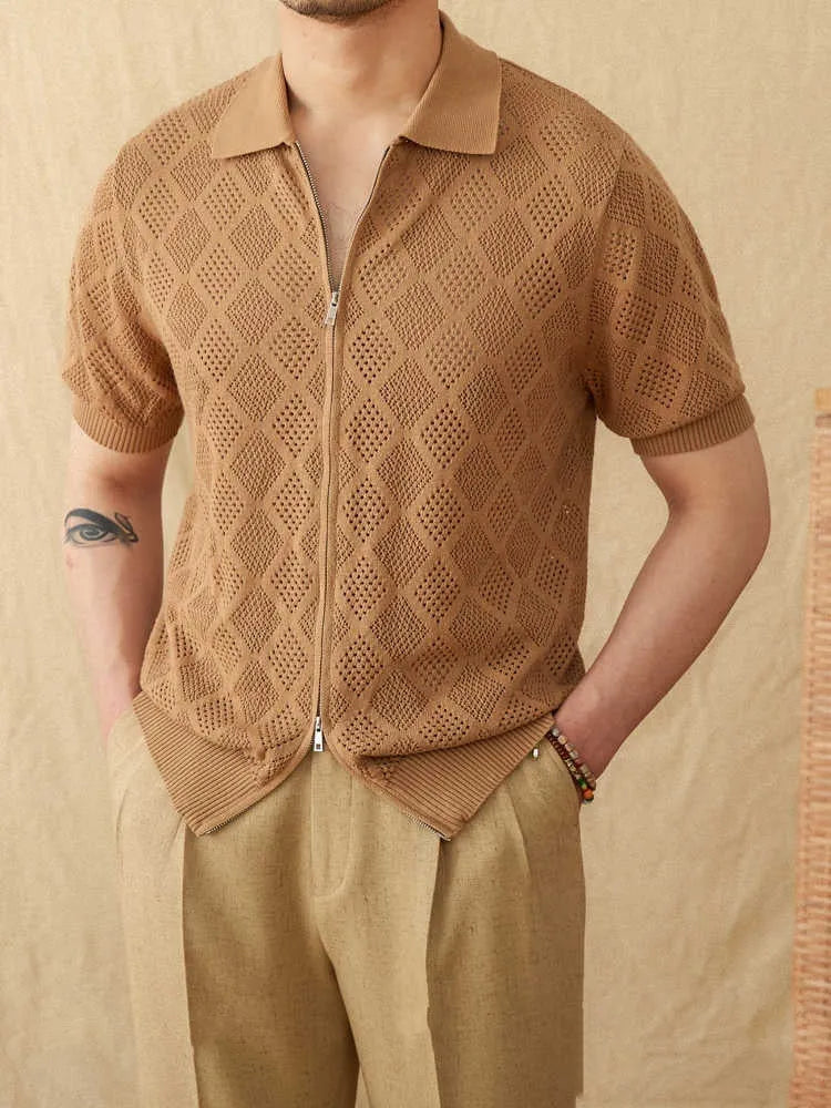 Light brown cotton short-sleeve cardigan with zipper and lapel collar laid flat.