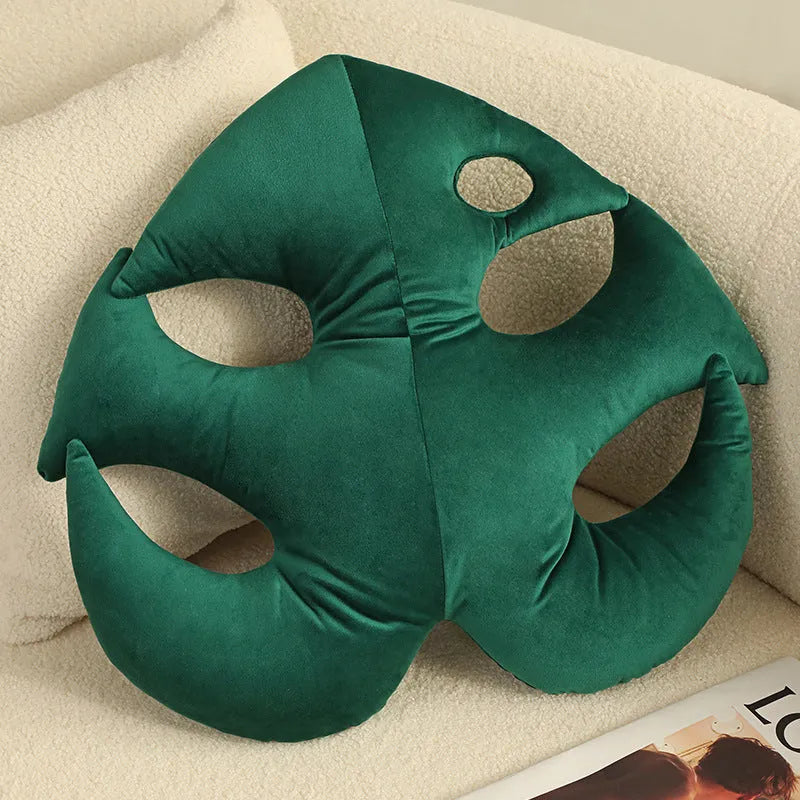 Large embroidered botanical cushion with Monstera deliciosa pattern on plush fabric