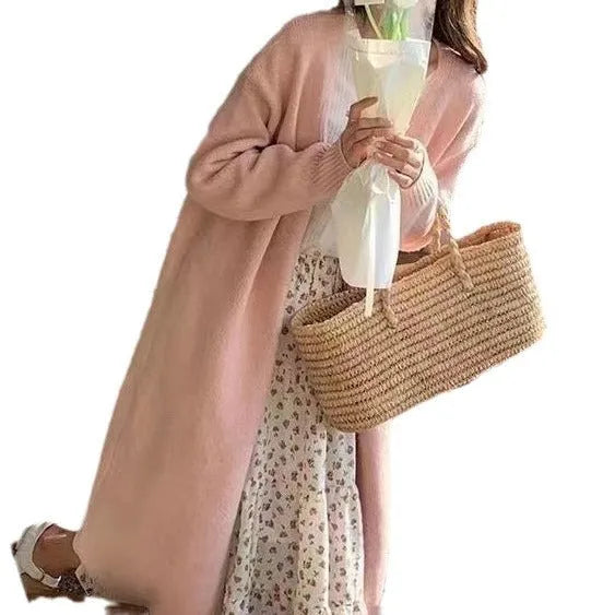 Women's mid-length knitted V-neck cardigan in a loose fit, shown in khaki colour.