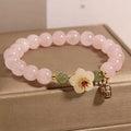 Women's crystal and Hetian jade beaded bracelet with peach blossom charm in blessing card colour