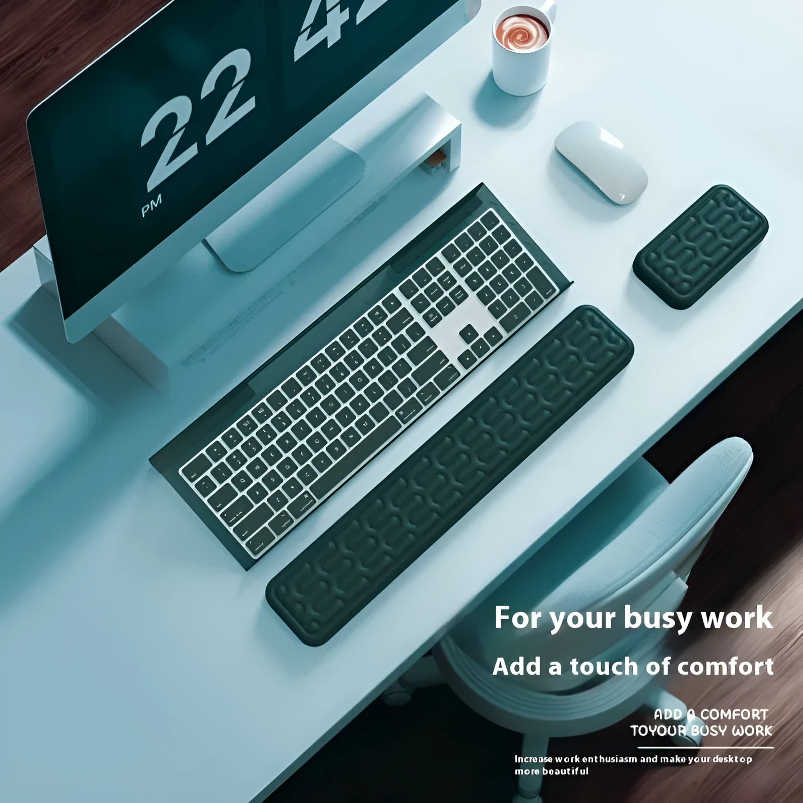 Double-sided keyboard and mouse pad with memory foam wrist rest on a resin base.