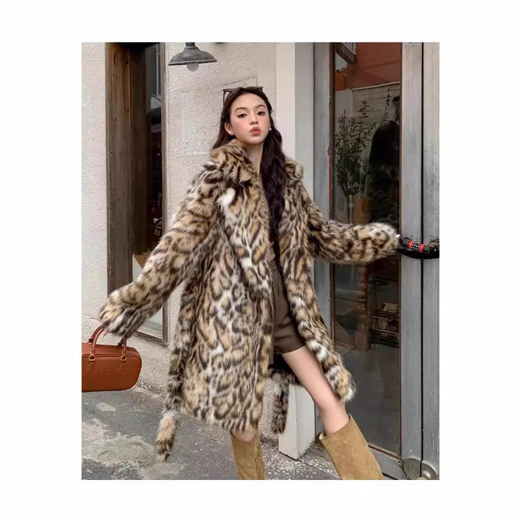 A long faux fur coat with a thick fur collar and pockets, shown in a street-fashion style.