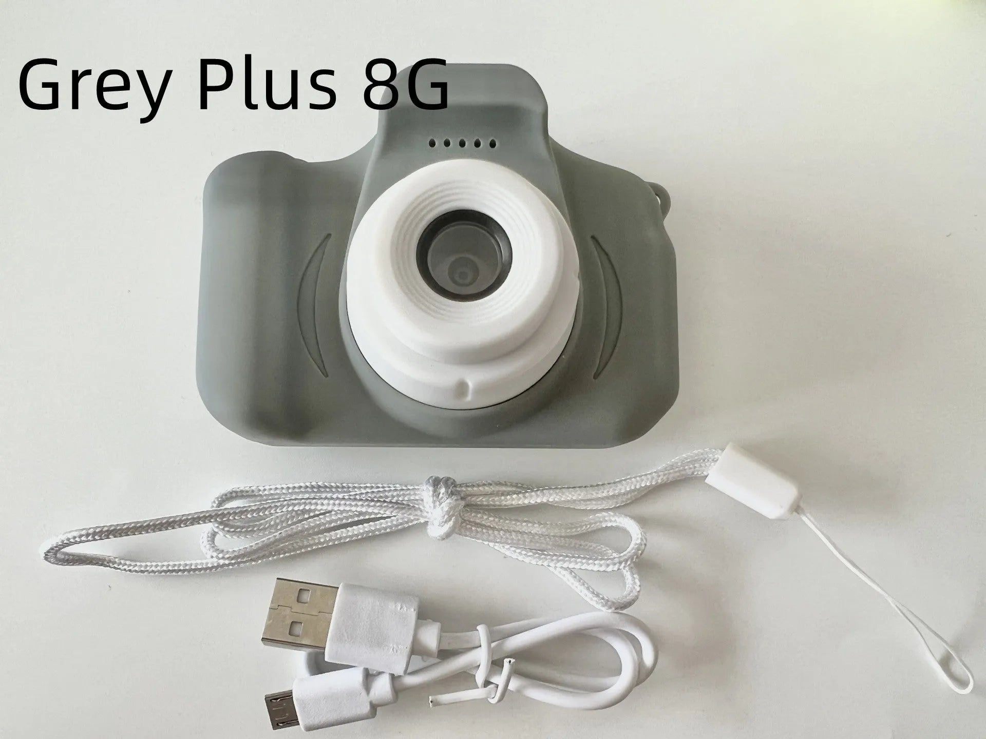 X2 HD mini cartoon kids digital camera in silicone body with 2-inch screen and lanyard.