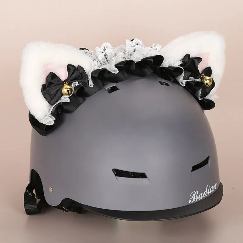 Plush cartoon-themed cover set on a medium motorcycle helmet with soft ear decorations.