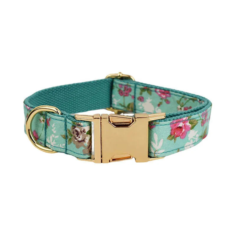 Rose print fabric dog collar set with green detachable bow, leash, and vest for pets
