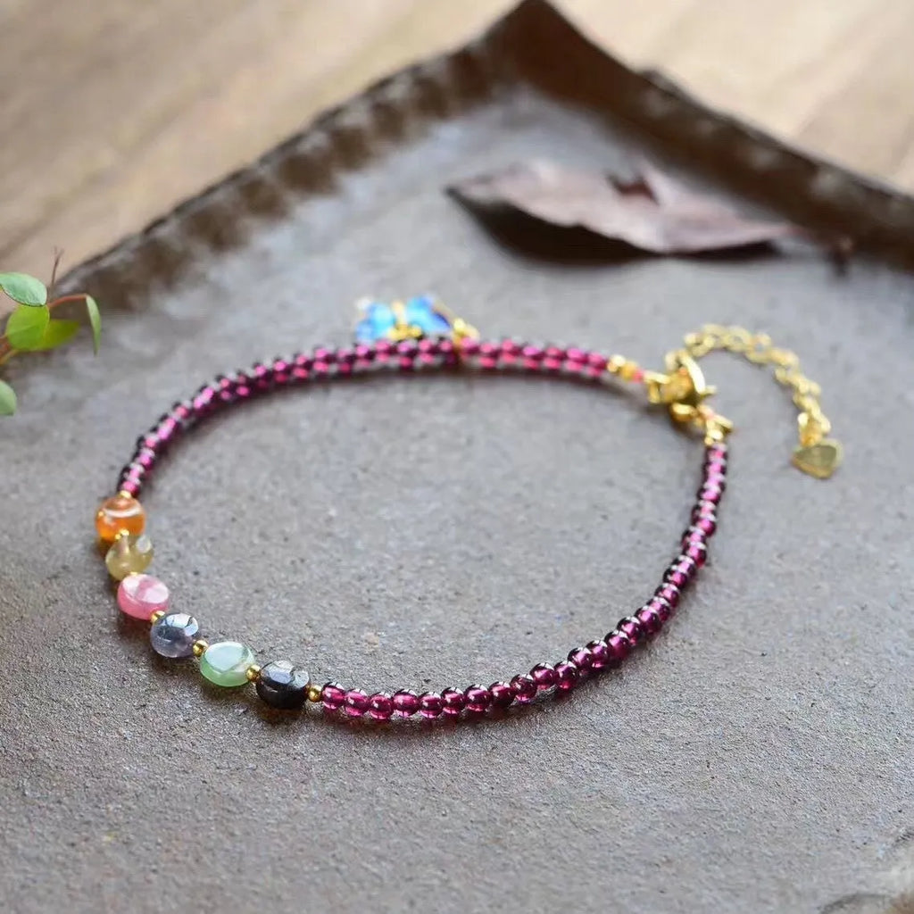 Purple garnet stone women's anklet with ethnic geometric design on ankle