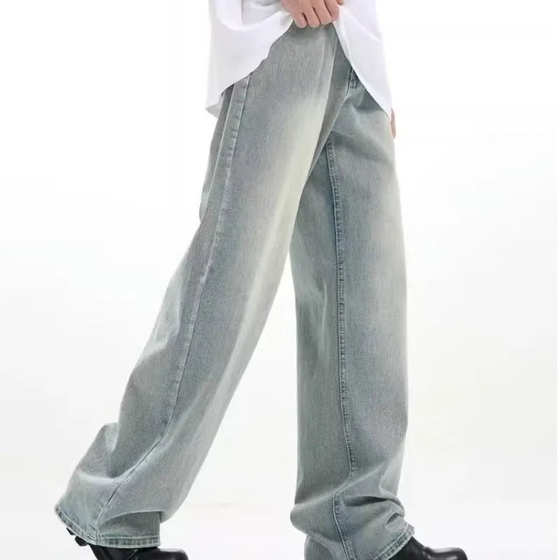 Blue men's loose casual trousers with a retro style and elasticated waistband.