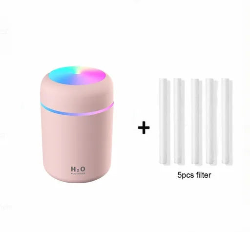 Pink car USB humidifier with LED lights showing water tank and control button