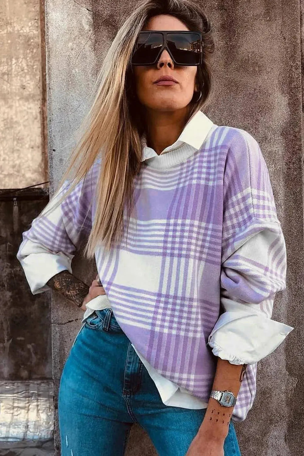 Lilac plaid print loose long-sleeved sweater with ribbed trim on cuffs and hem.
