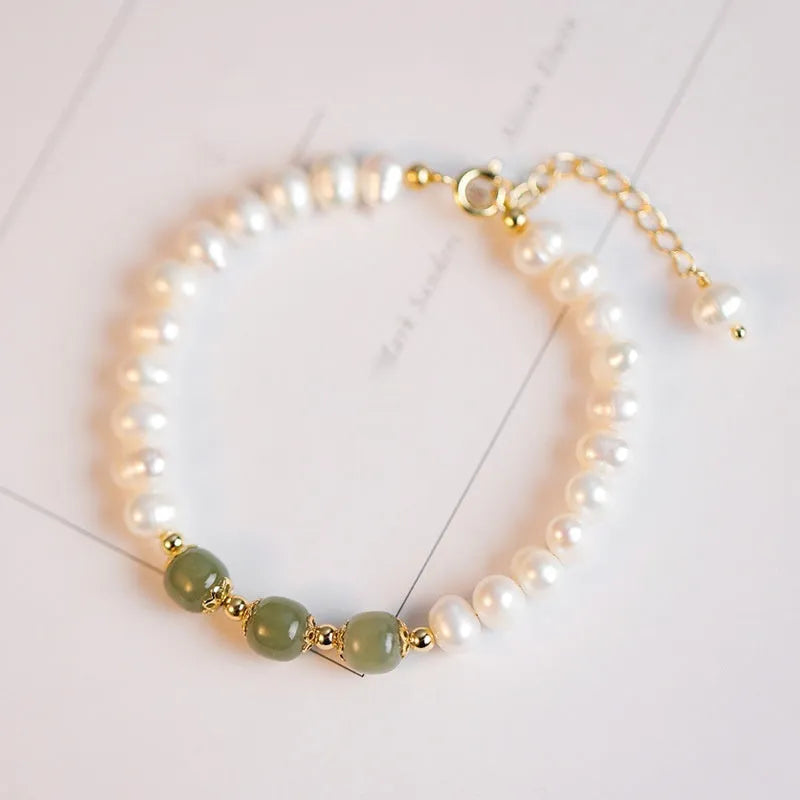 Korean style freshwater pearl bracelet with a diamond-shaped pearl in an electroplated Hetian jade colour.