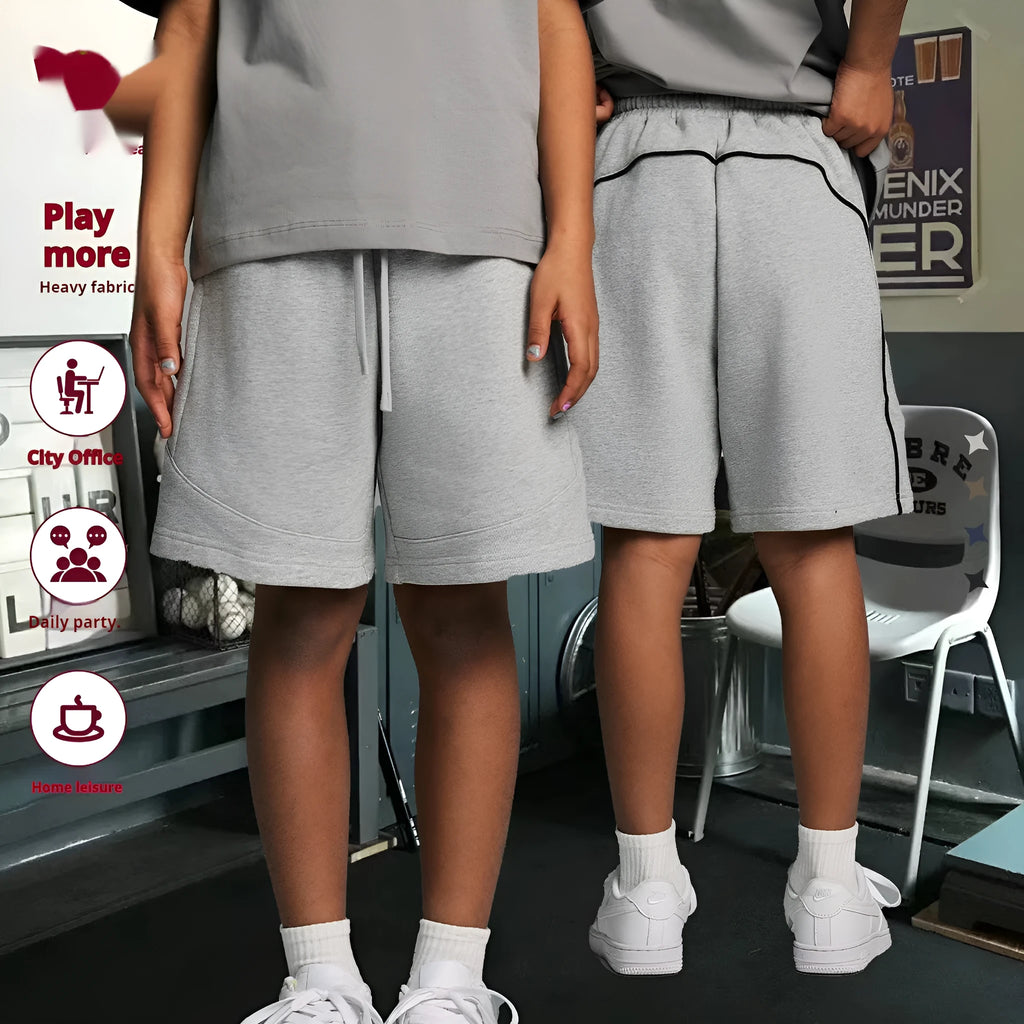 Children's loose-fit cotton shorts in solid colours for casual and sports wear