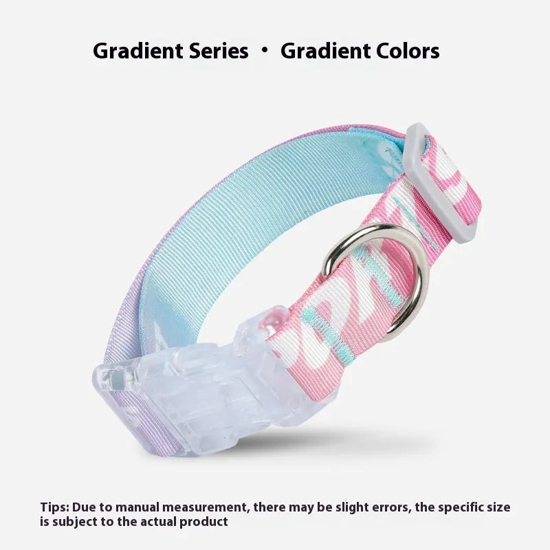 Adjustable nylon dog collar with a colourful cartoon gradient print, shown with a buckle.