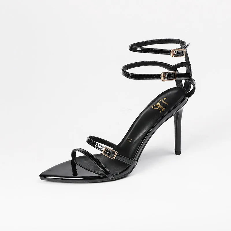 Black patent leather women's open toe ankle-strap stiletto sandals with 8cm heel and buckle closure