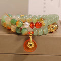 Peacock green agate double ring bracelet with safety buckle clasp and rhinestone decorative elements