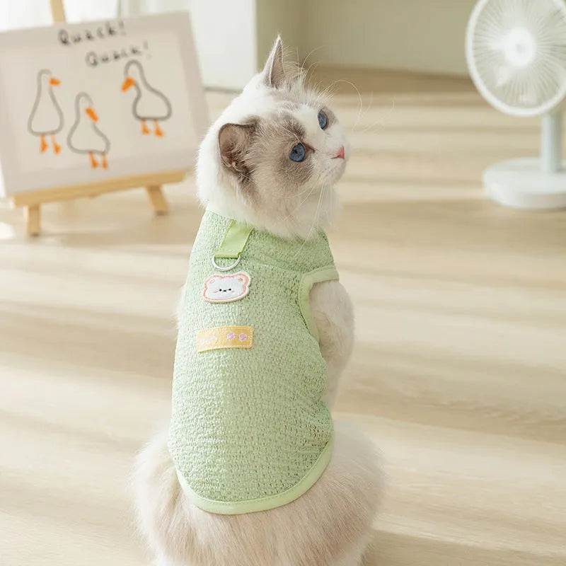 Breathable hollowed-out cat clothes with a cartoon bear patch in blue.