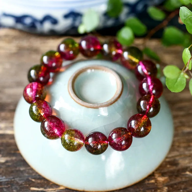 Women's handmade watermelon crystal bead bracelet showing options in different bead sizes.
