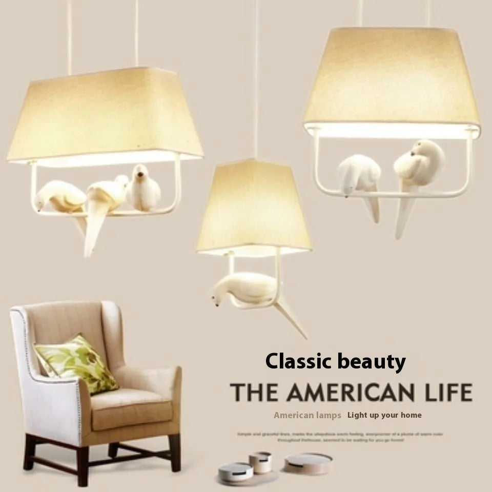 Iron bird chandelier ceiling lamp with fabric shades in bird-themed configuration