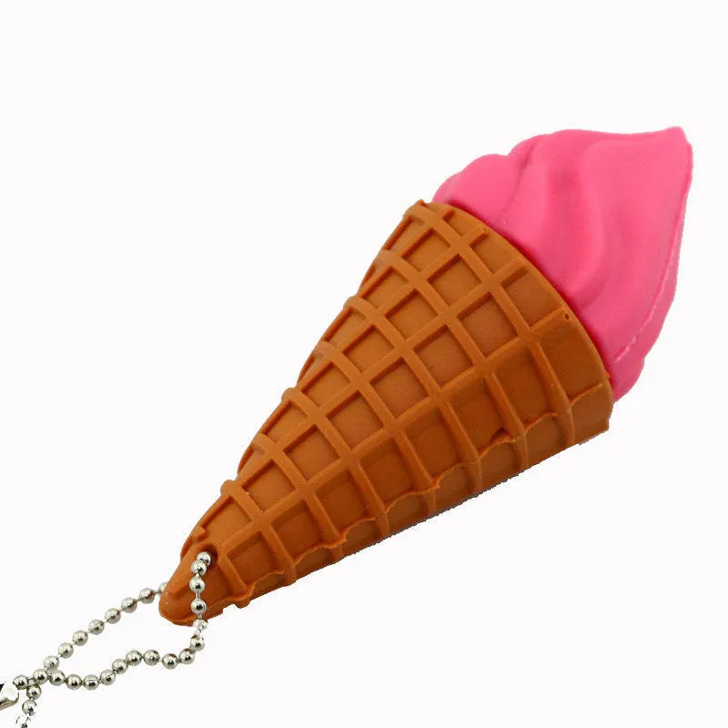 Cute mini ice cream-shaped USB flash drive in pink colours on a white background.