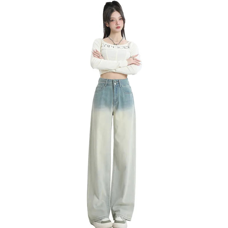 Women's gradient blue wide-leg straight-leg denim trousers on a hanger.