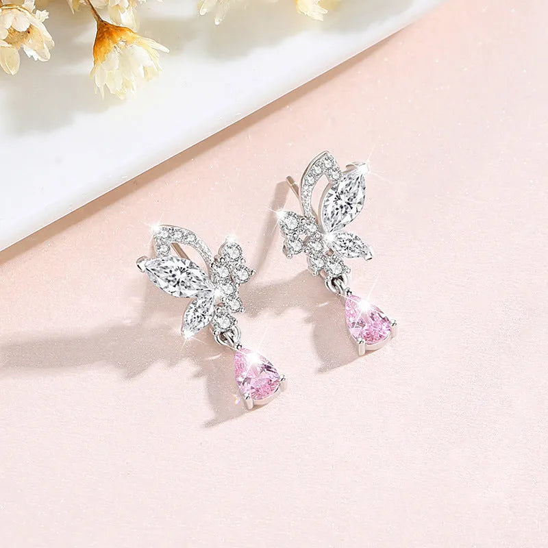925 sterling silver butterfly stud earrings for women with purple crystal accents on a white background.