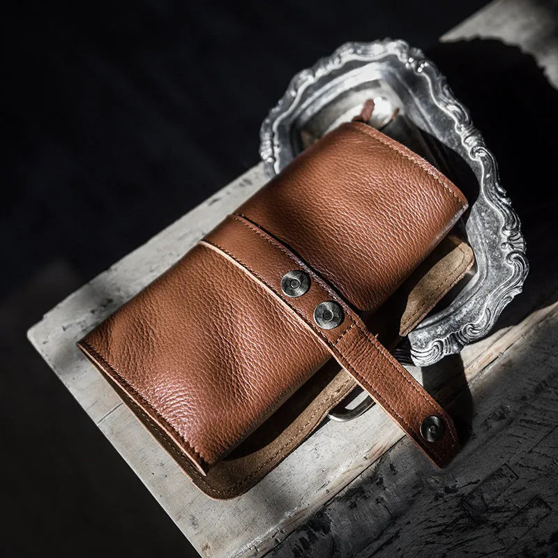 Handmade cow leather vintage wallet in black or dark brown with tape extraction closure