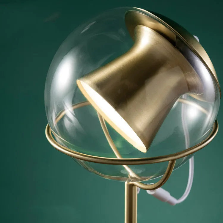 Contemporary desk lamp with a glass lampshade, dimmable LED light, and touch switch control.