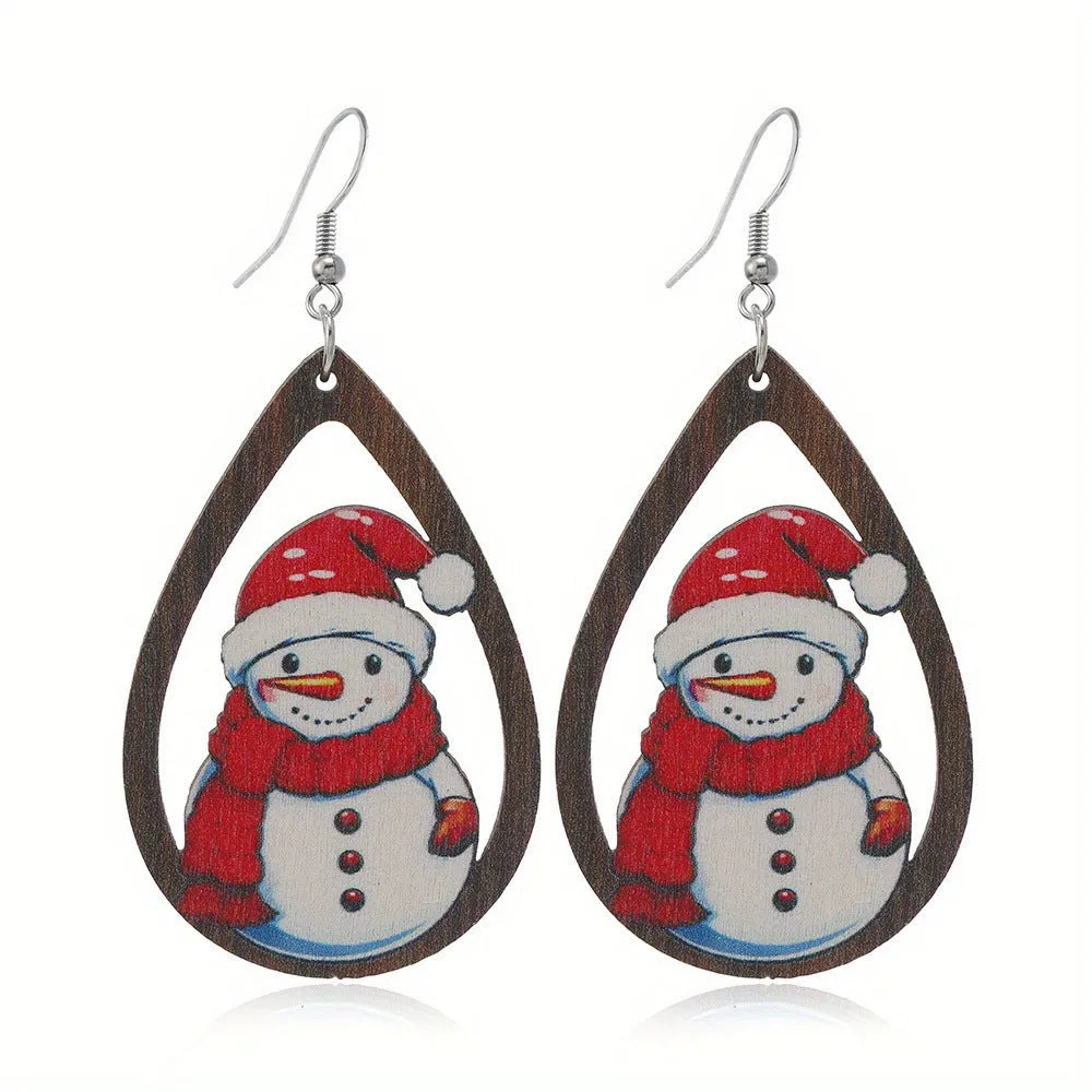 Wooden Christmas earrings with printed geometric designs featuring Christmas tree and snowman patterns