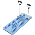 Pink portable abdominal exercise board with wheels on wooden floor