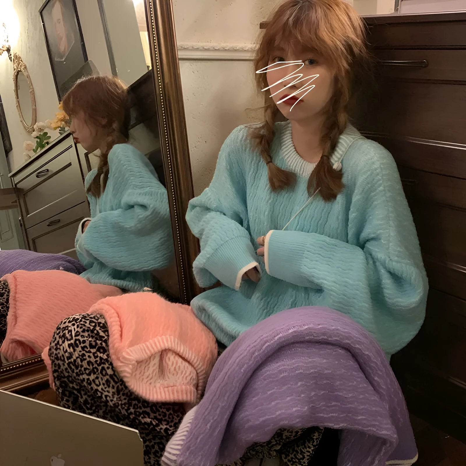 Women's loose retro pullover sweater in lake blue, purple and pink colours showing regular sleeves and medium thickness
