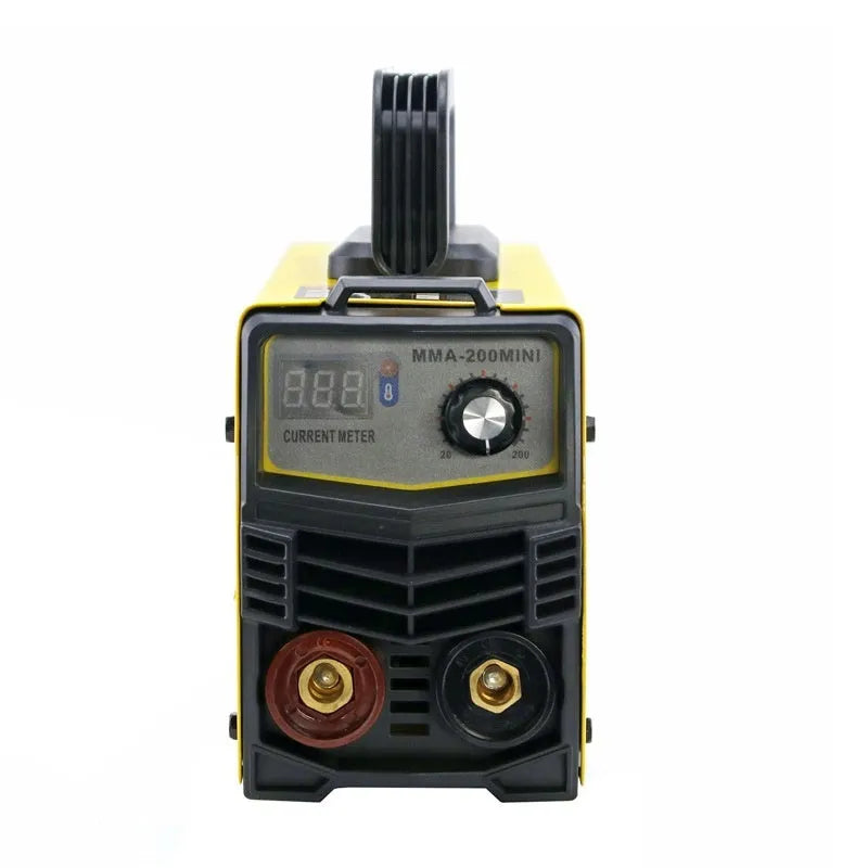 MMA-200MIN compact DC welding machine with welding tongs and face shield on a workbench.