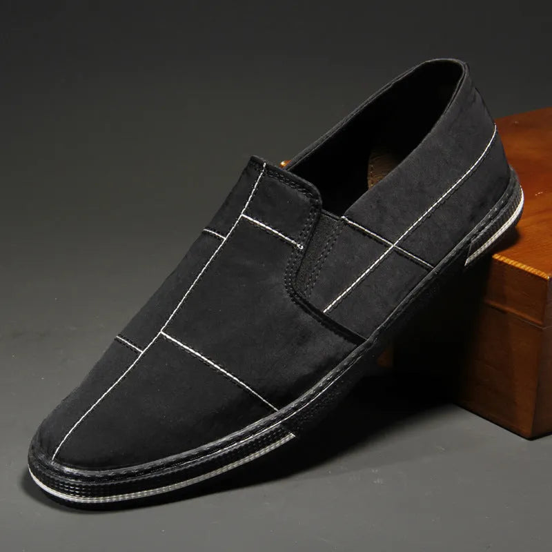 Men's slip-on canvas shoes in multiple colours with vulcanised rubber soles and round toe design