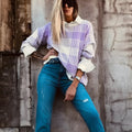 Lilac plaid print loose long-sleeved sweater with ribbed trim on cuffs and hem.