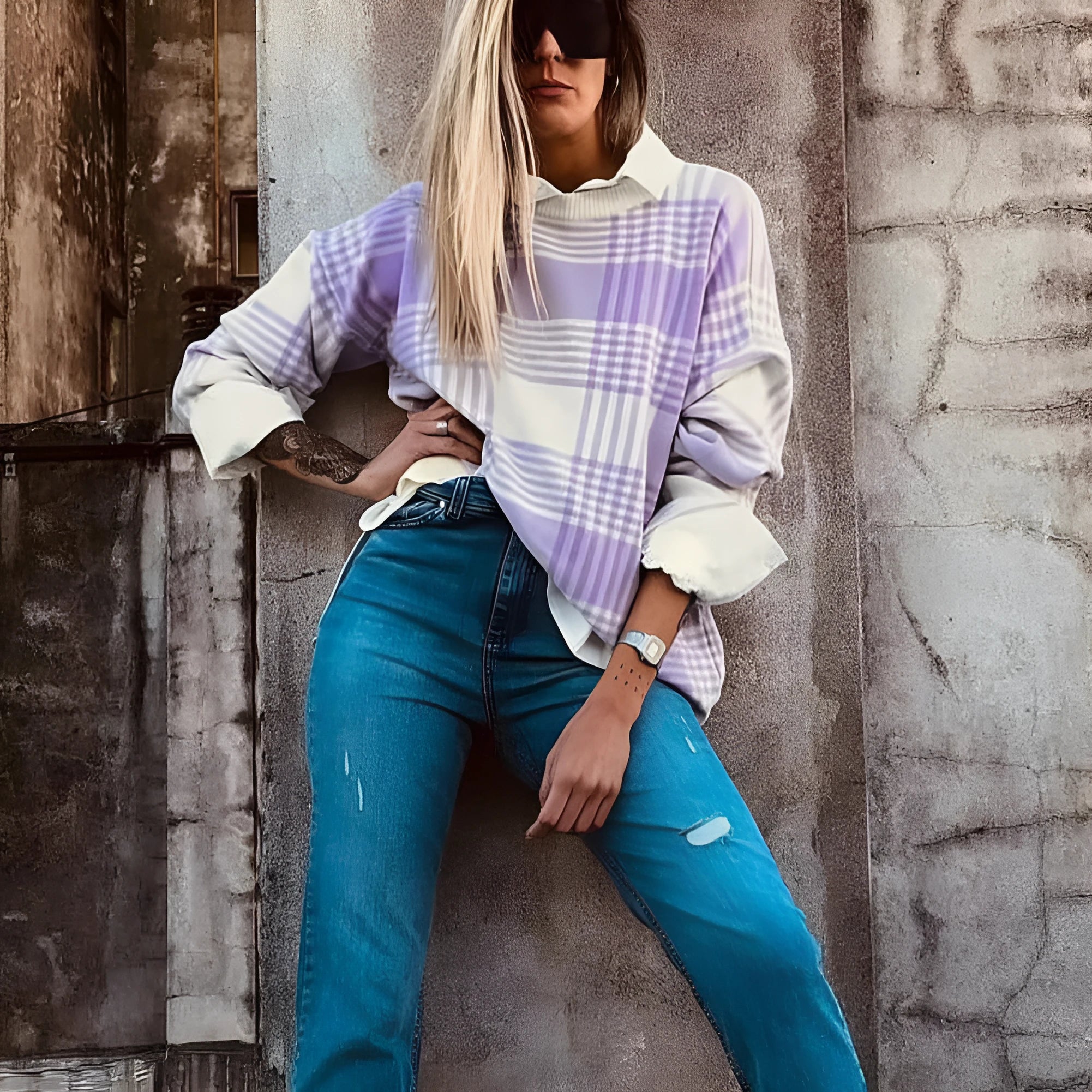Lilac plaid print loose long-sleeved sweater with ribbed trim on cuffs and hem.