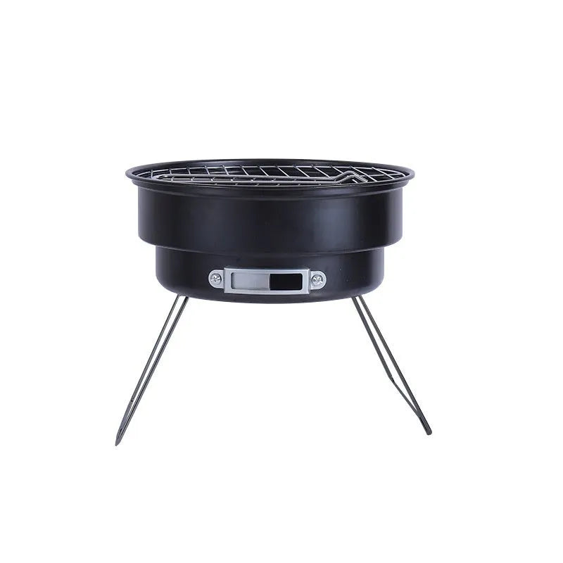 Compact metal folding round ice stove grill with legs, mesh, and carry bag for outdoor cooking.